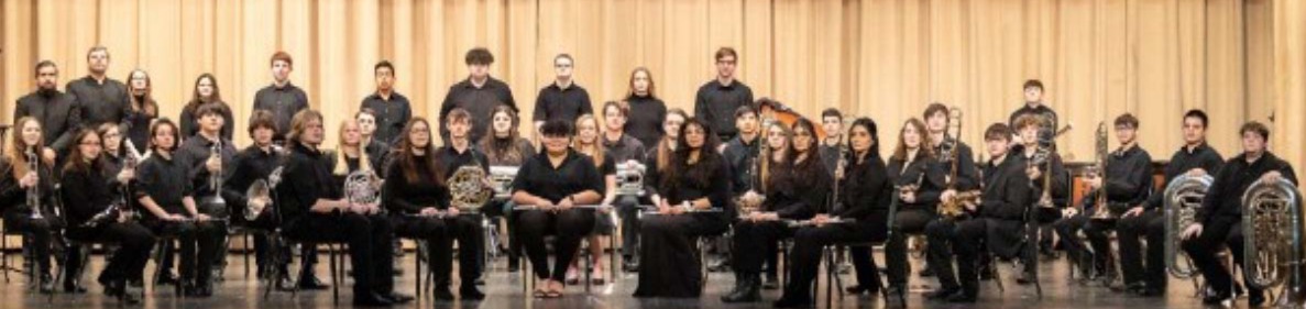 group picture of students in a concert band setting