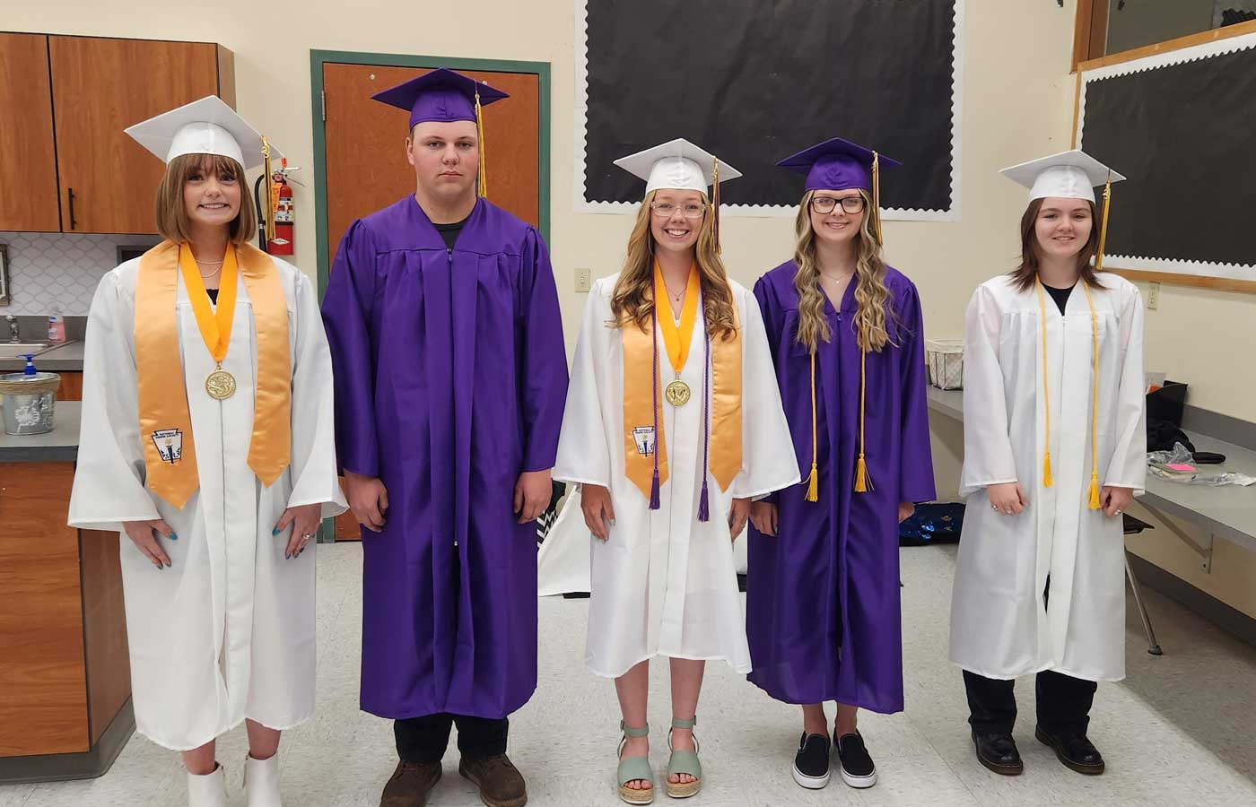 graduates in gown