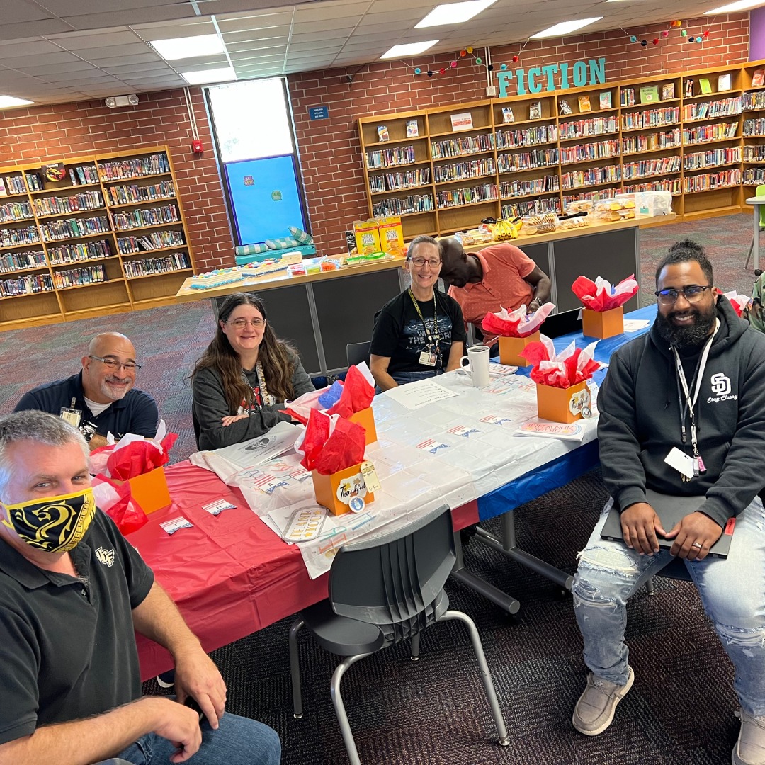 Veteran Staff members enjoying veterans day celebration