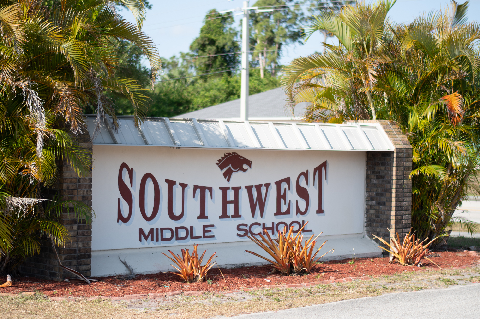 Southwest Middle School sign with trees in background
