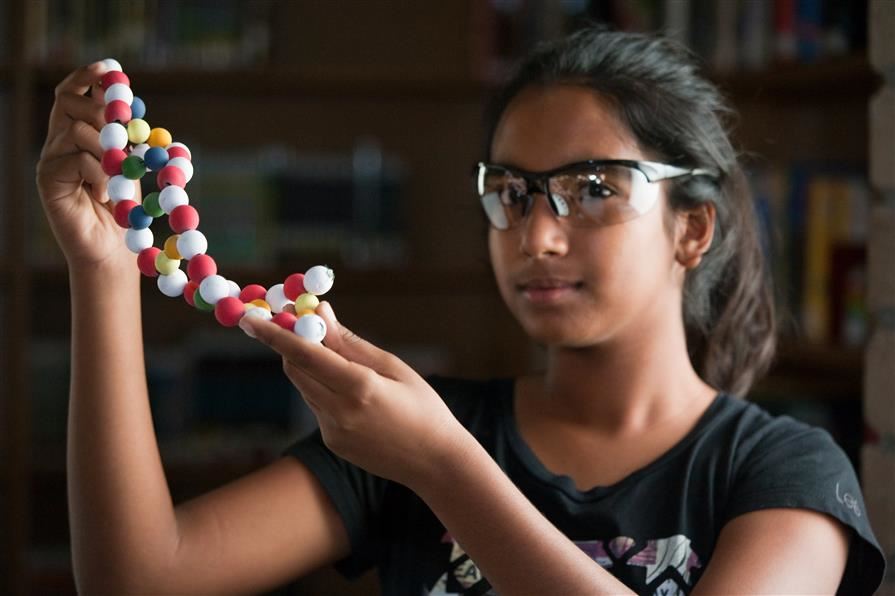 Student showing DNA