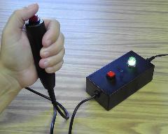 Person holding buzzer button