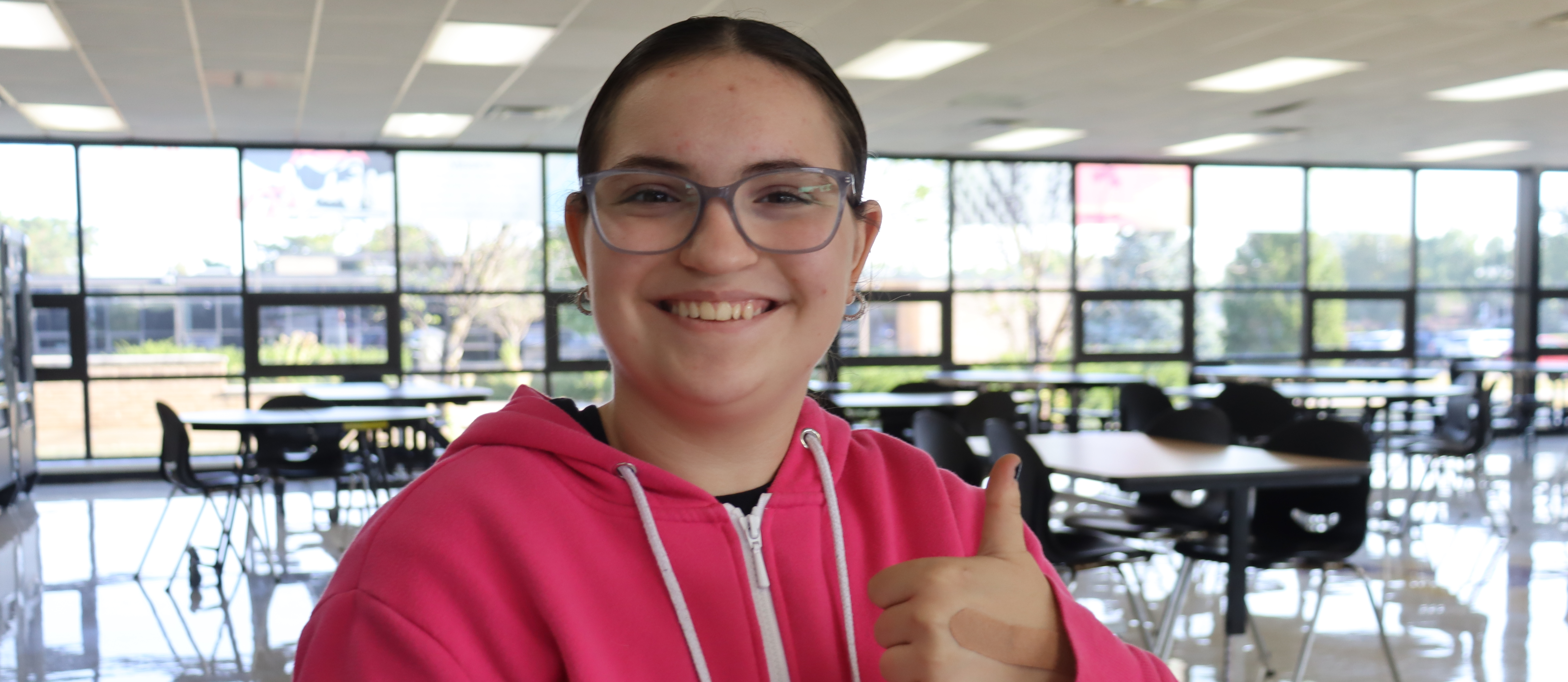 Girl with thumbs up