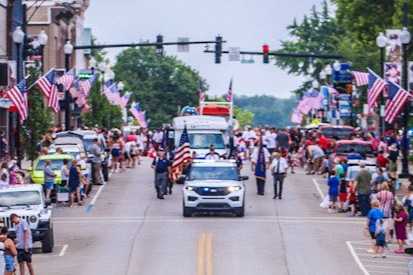 Image showing police vehicles lined up for 4th of July parade