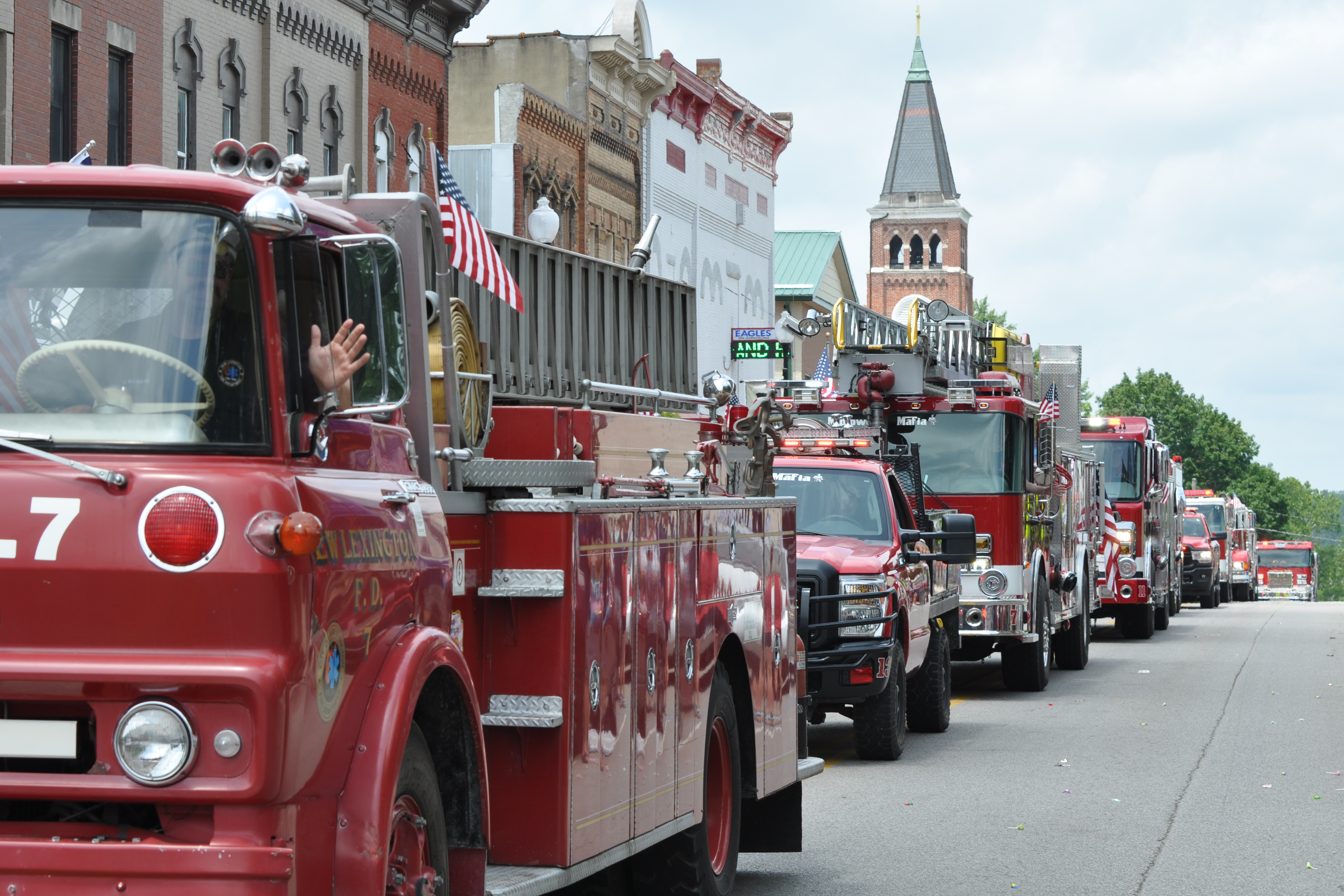 Image showing New Lexington Fire Department vehicles lined up at 4th of July parade