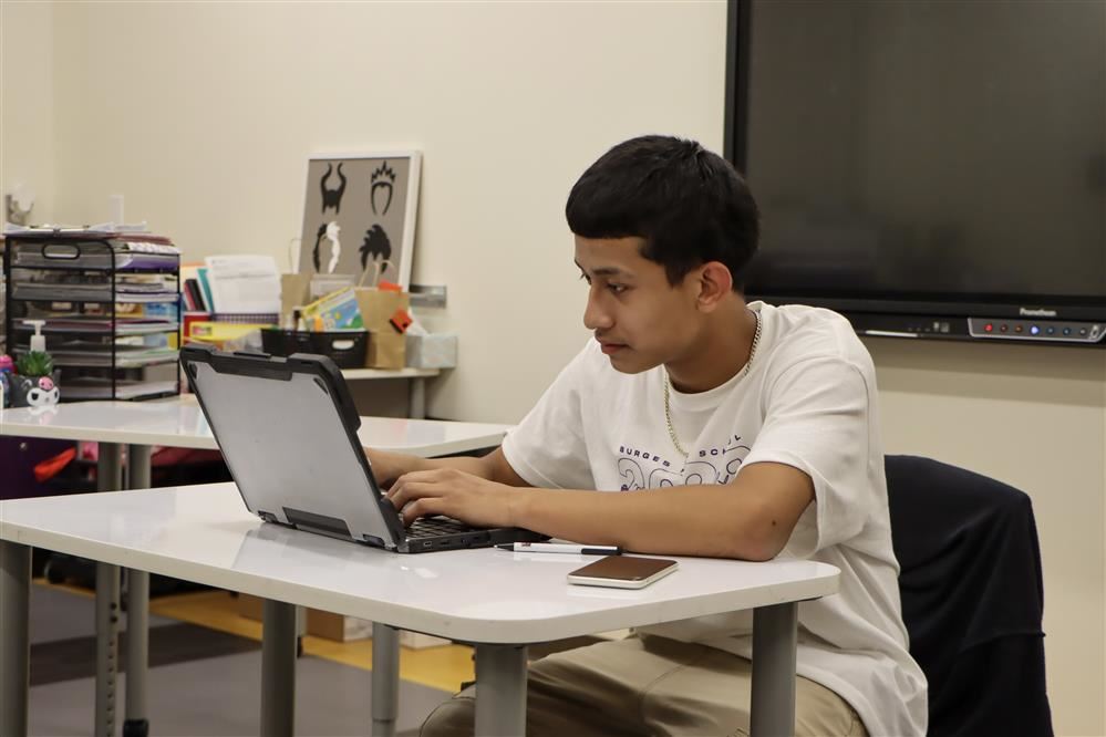 boy using a laptop