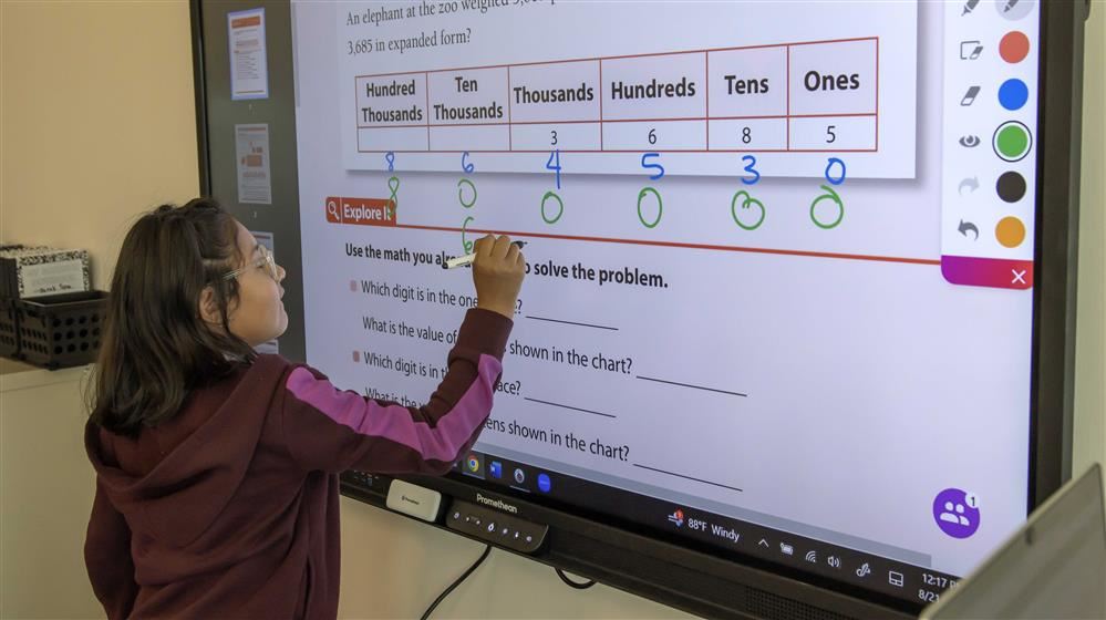 girl using a digital board