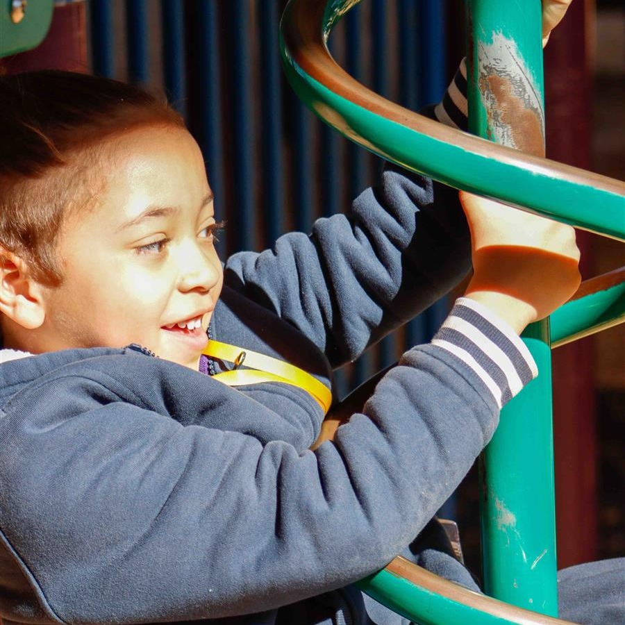 kid playing on the play ground