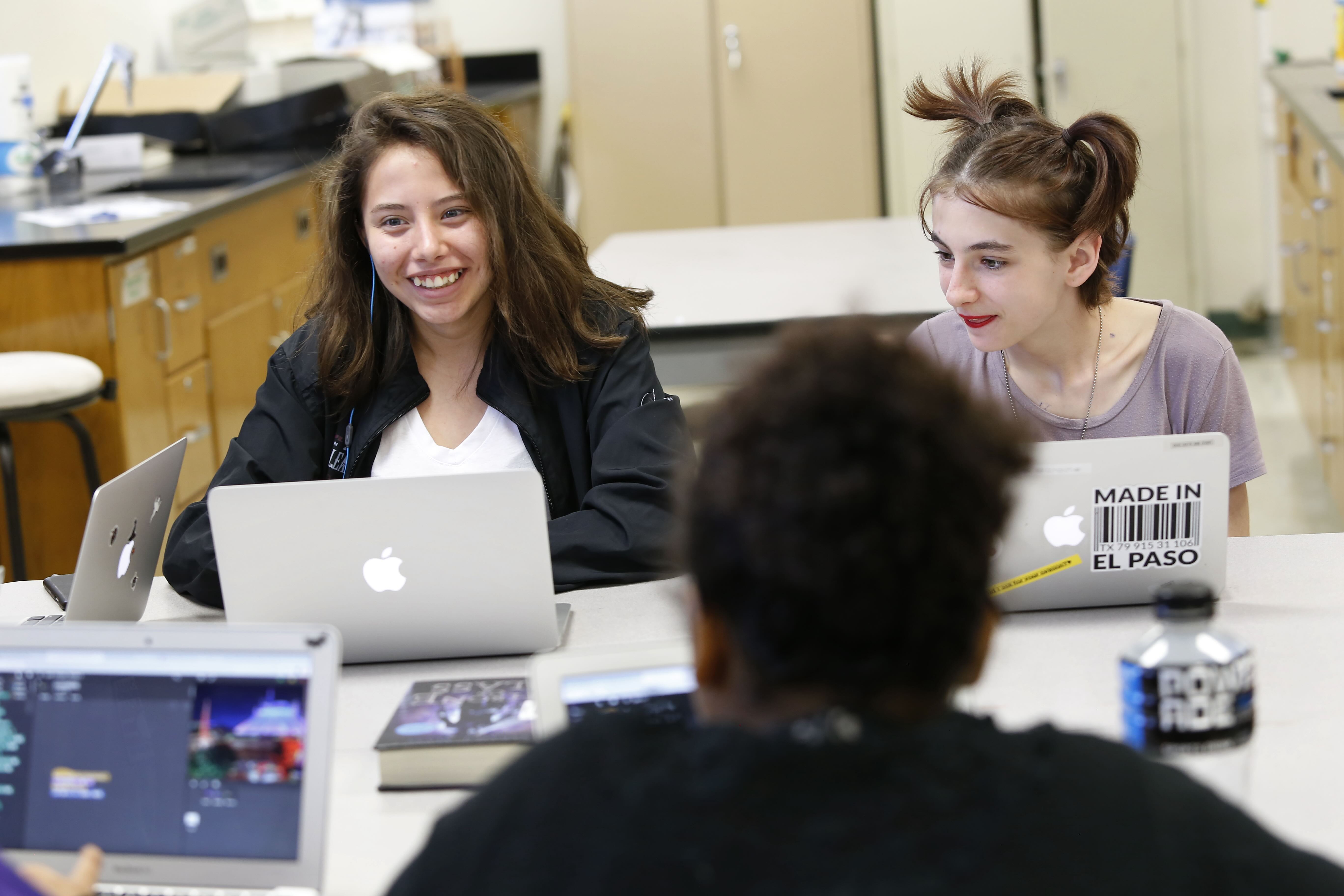 Students Using Devices Image