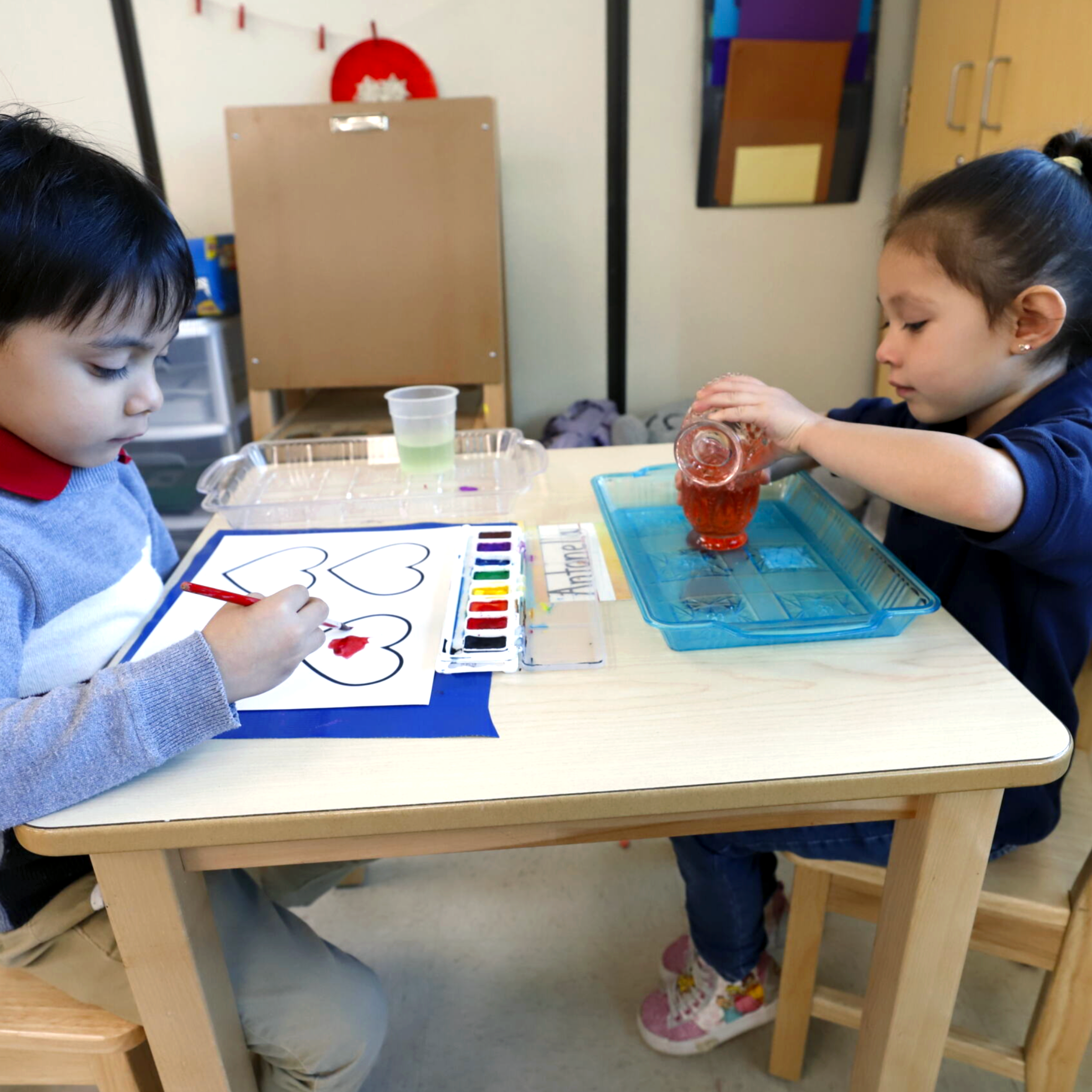 two students at a desk