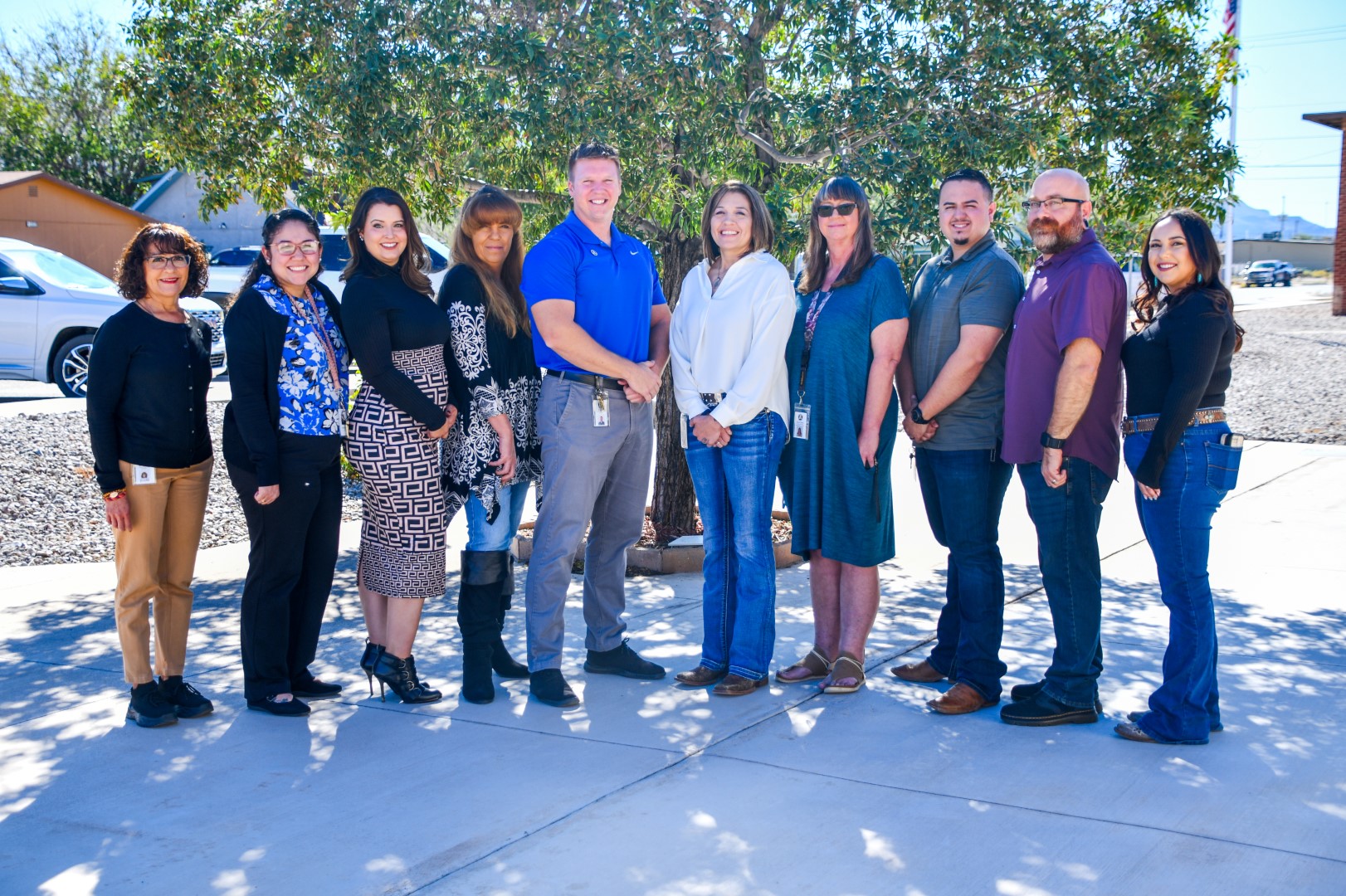 HR Staff Photo outside by a tree