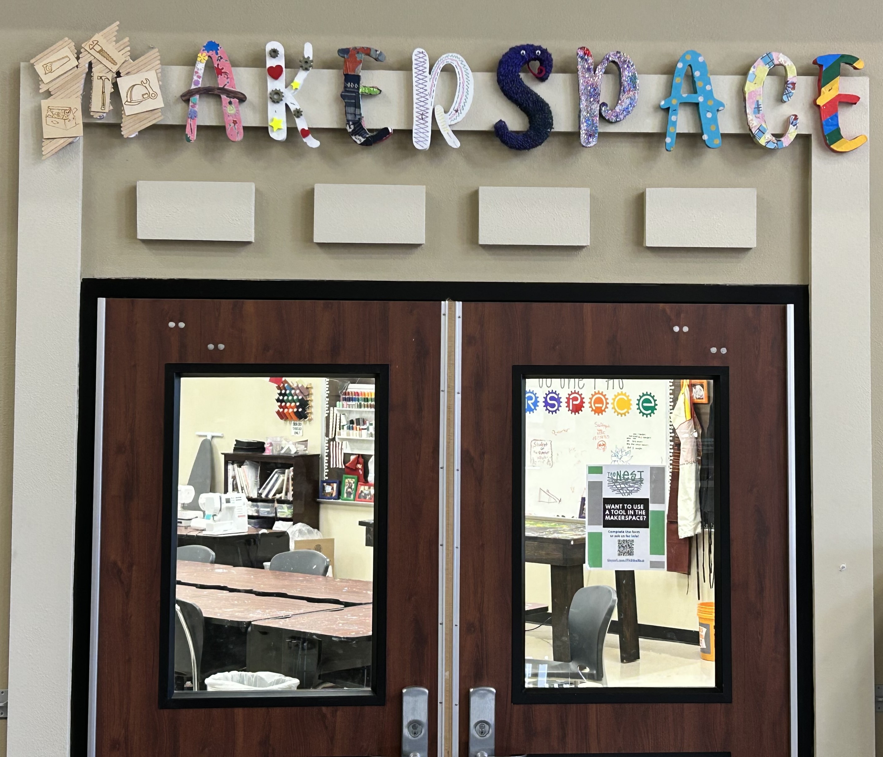 Image of two doors with Makerspace written above.
