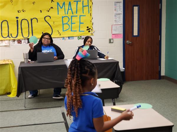 students and teachers from the math bee club having a day full of different activities