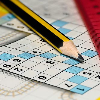 Pencil resting atop a SoDuko puzzle