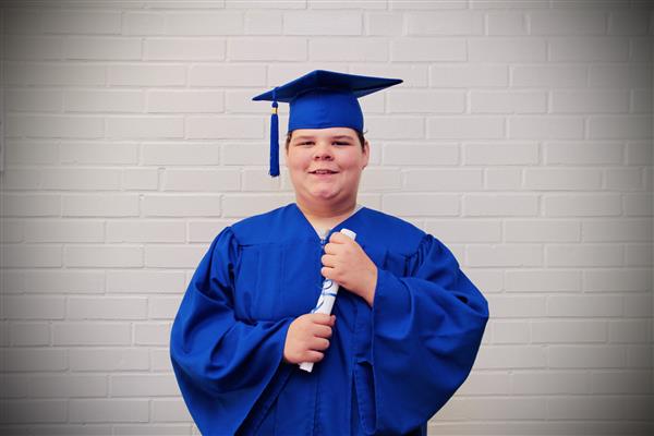 kid graduation headshot