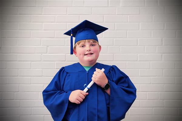 kid graduation headshot