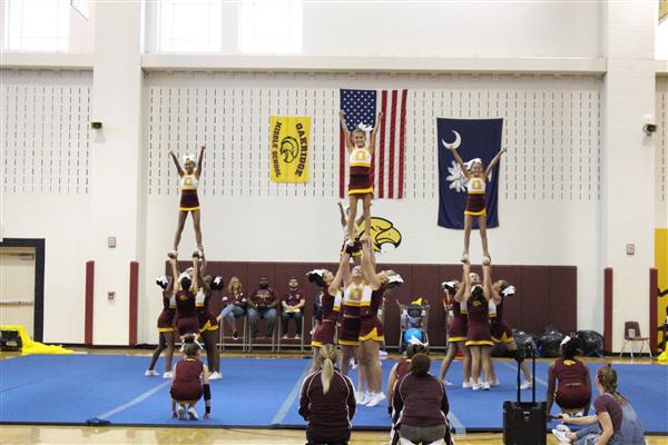 Cheerleaders  making a pyramid 