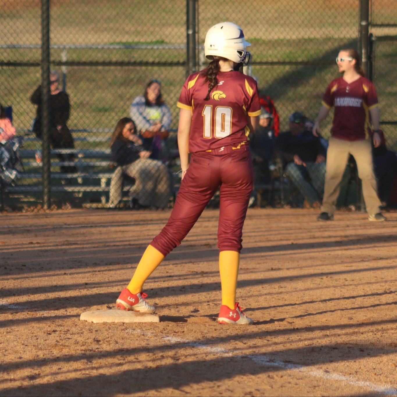 softball player on base