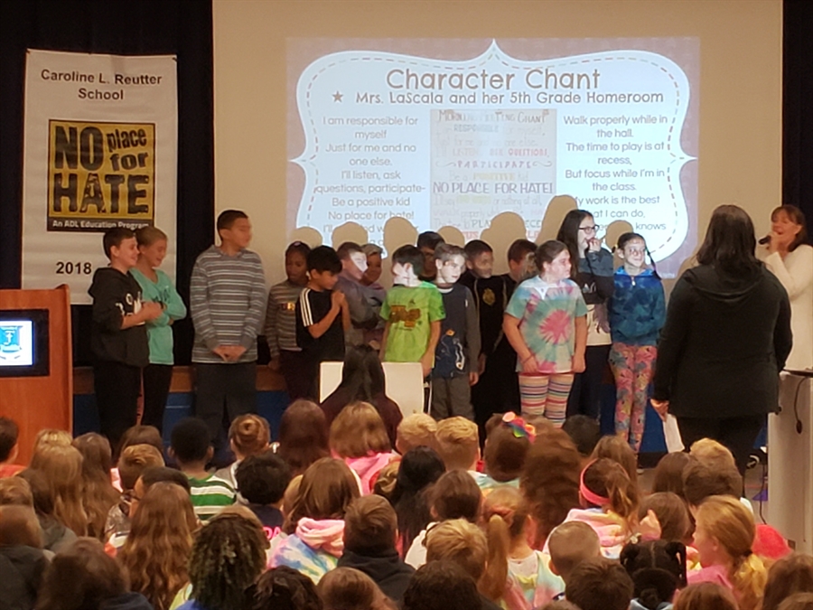 Students giving a presentiation about character chant