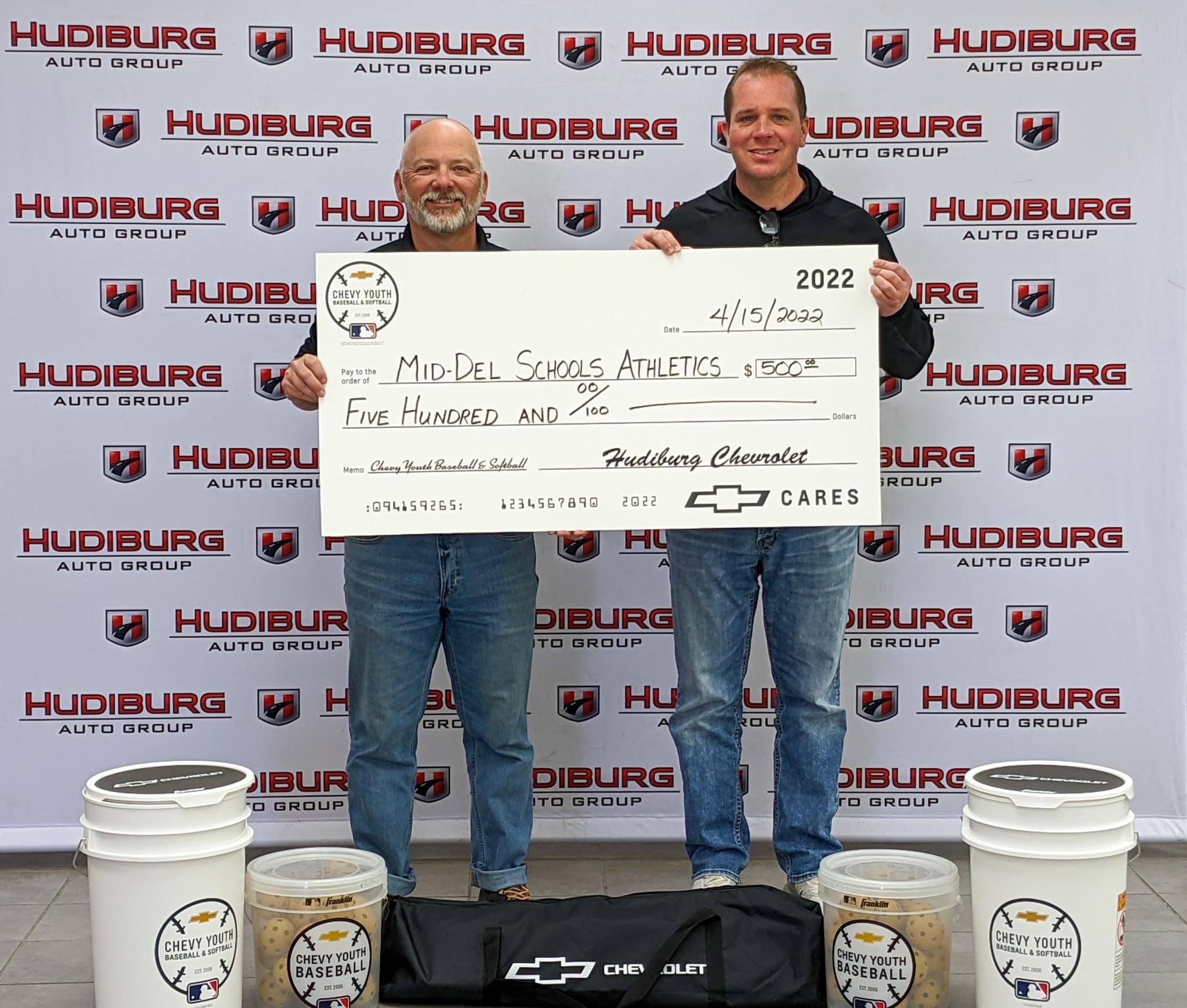 Hudiburg Chevrolet and Chevy Youth Sports is proud to partner with Mid-Del Athletics to provide new equipment to the baseball and softball programs. Pictured is Brian Black from Hudiburg Auto Group and Andy Collier, Director of Student Activities.