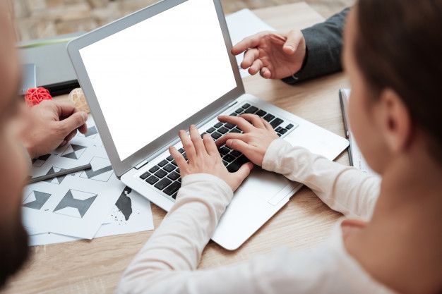 A woman searching on her computers