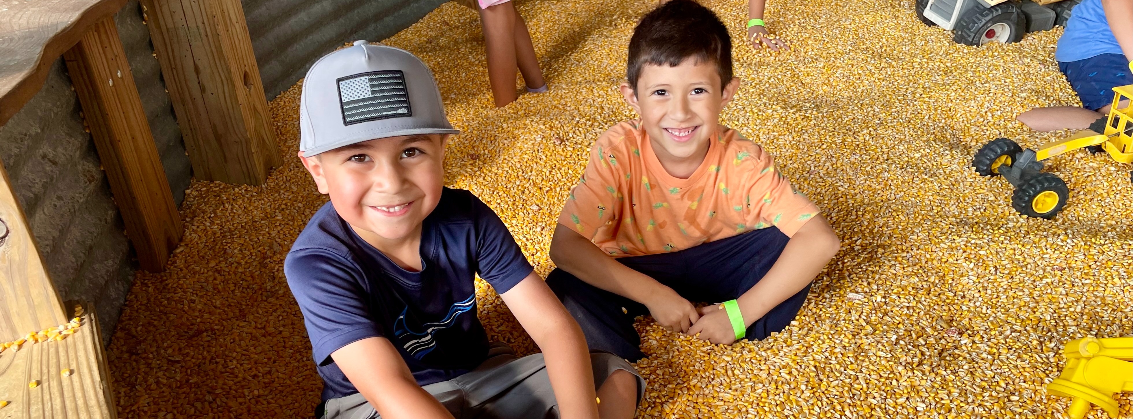 West Park Students sit in a giant grain bin on a recent field trip.