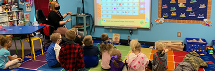 Kindergarten on the floor learning with smart board