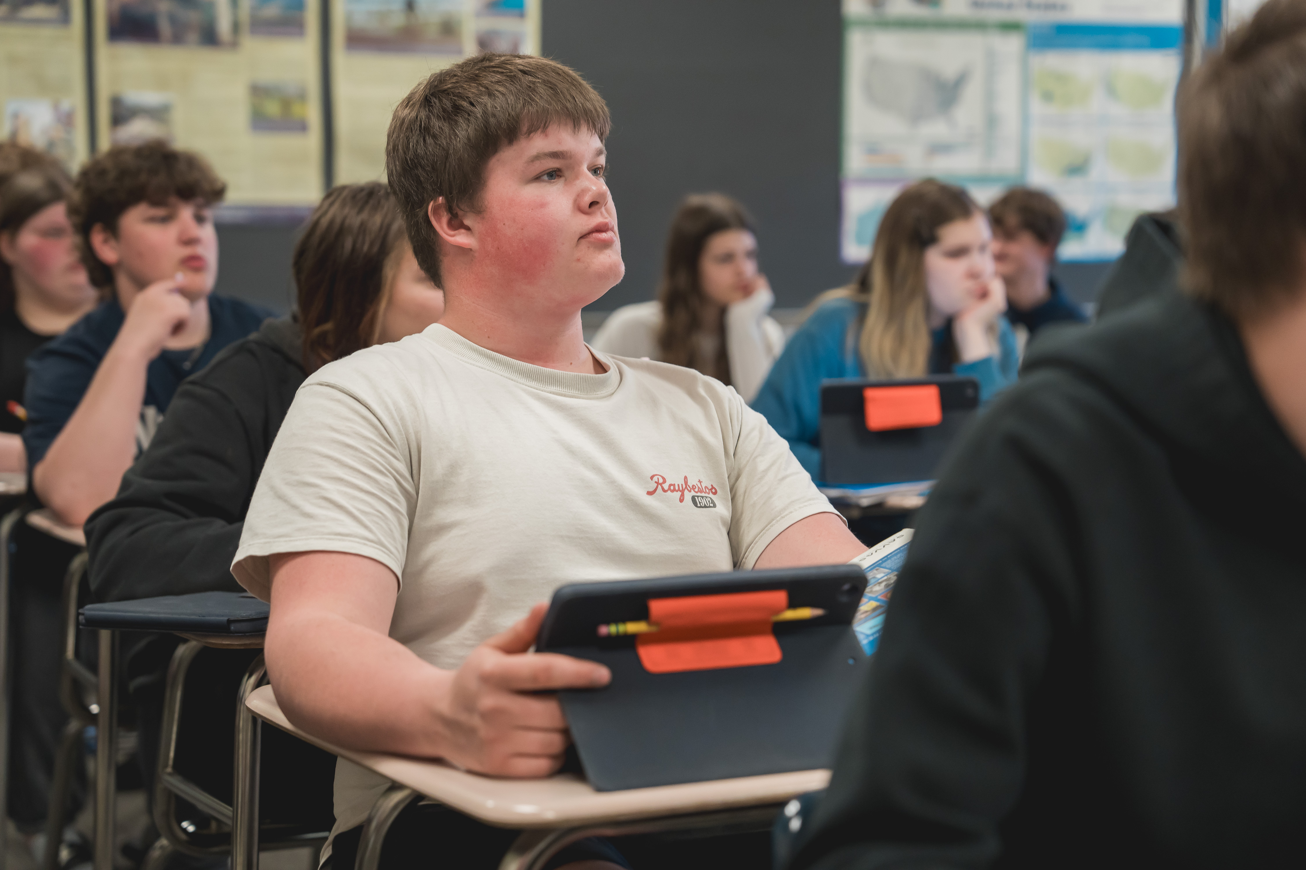 NV student with iPad in class