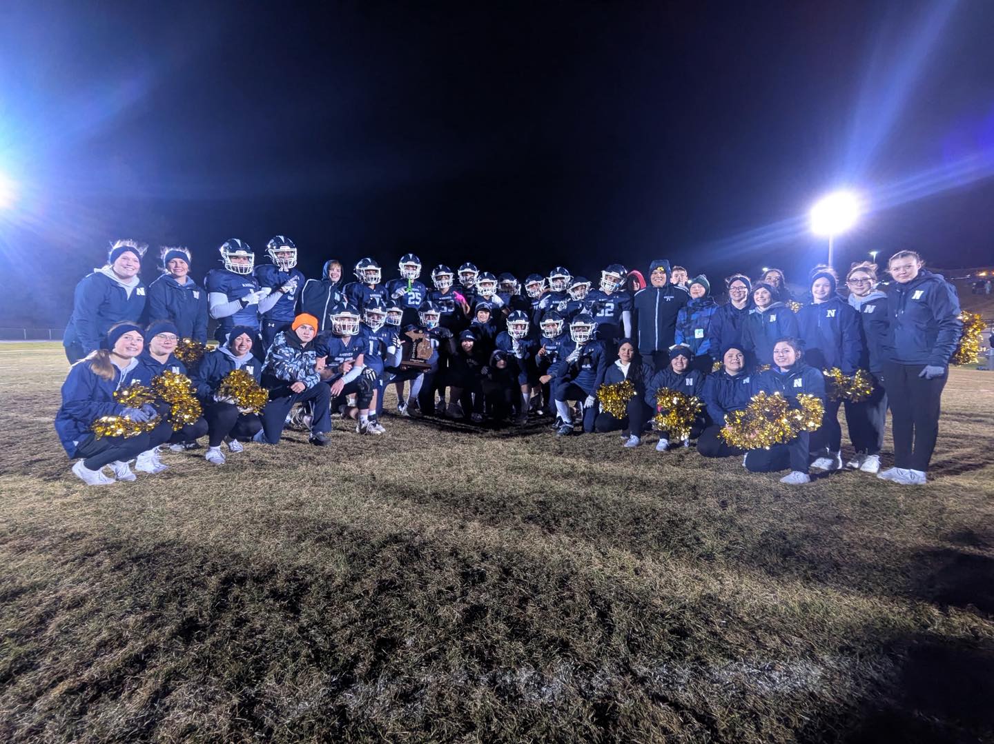Norway football team and cheerleaders on the football field