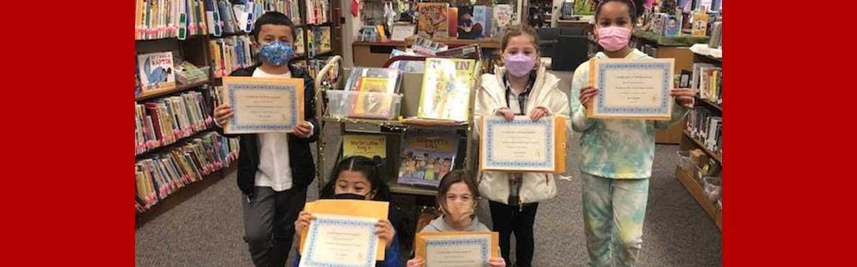 Senator Chris Murphy’s 6th Annual Martin Luther King Jr. Essay Participants Holding Their Certificates from Mrs. Melillo, JBS Media Specialist
