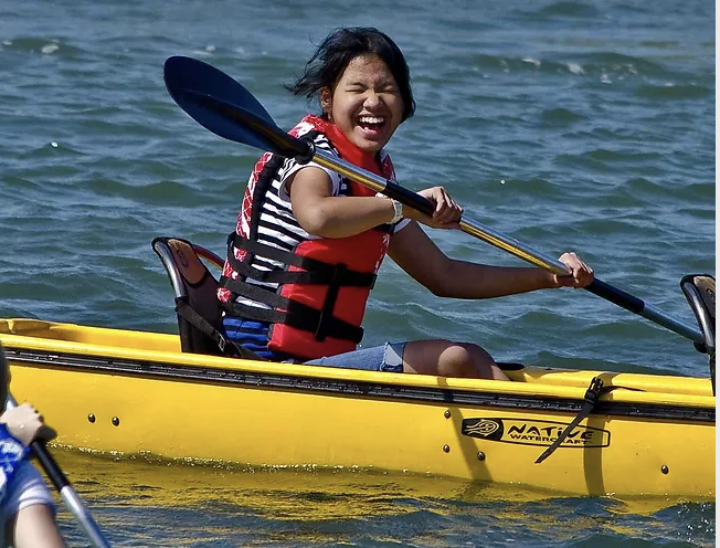 student practicing kayak