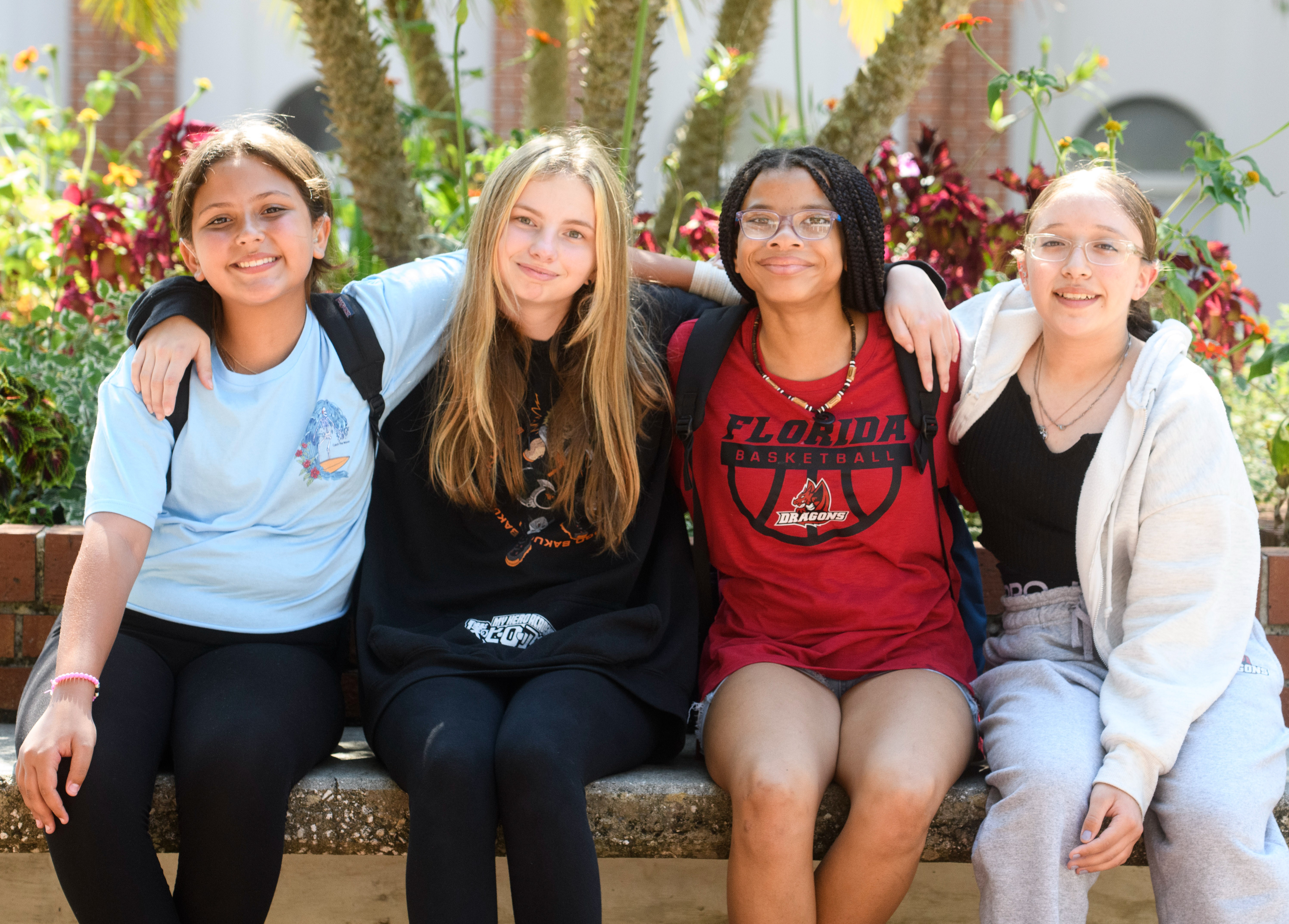 Four Deaf Middle School girls posing for group picture