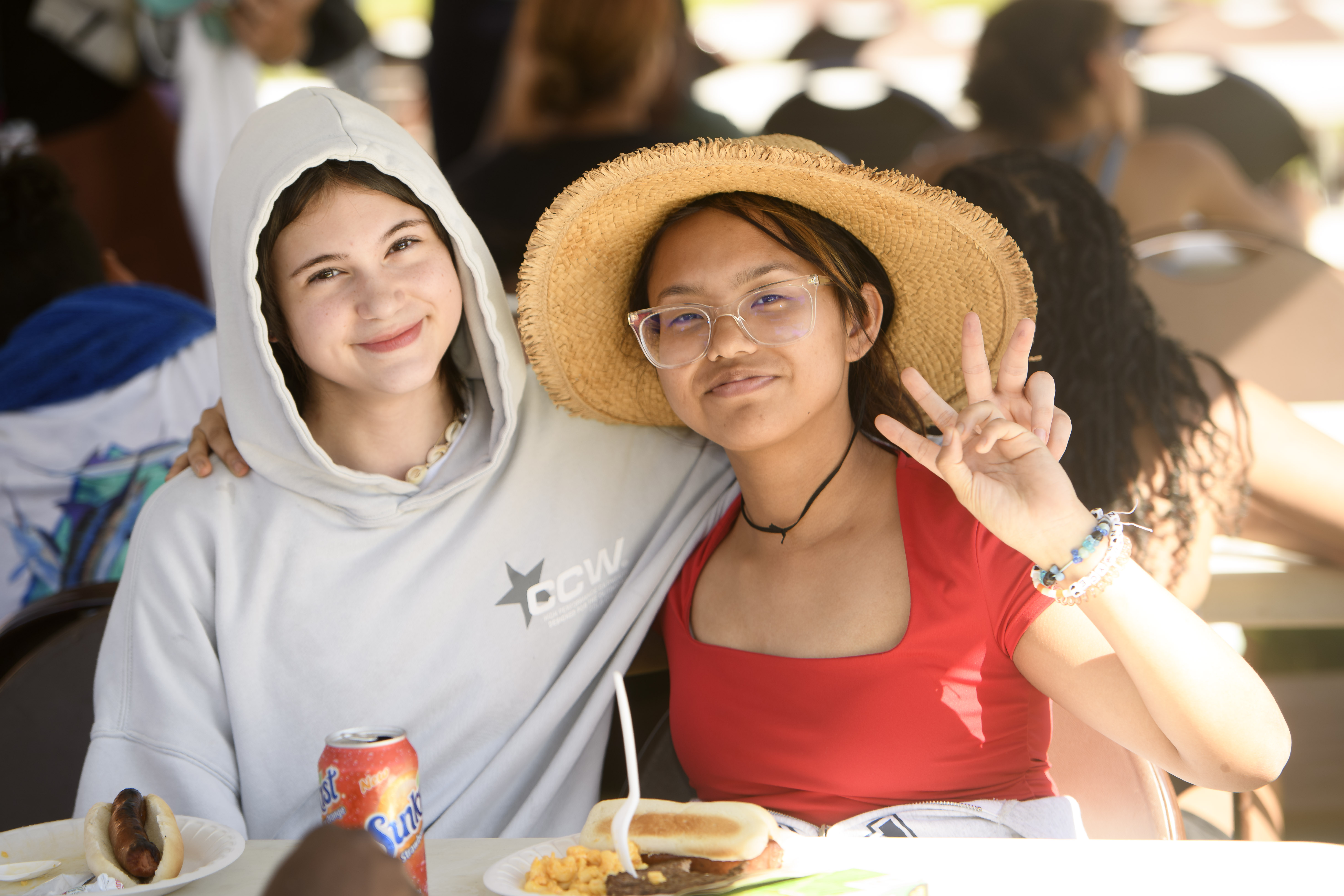 Two students at a cookout