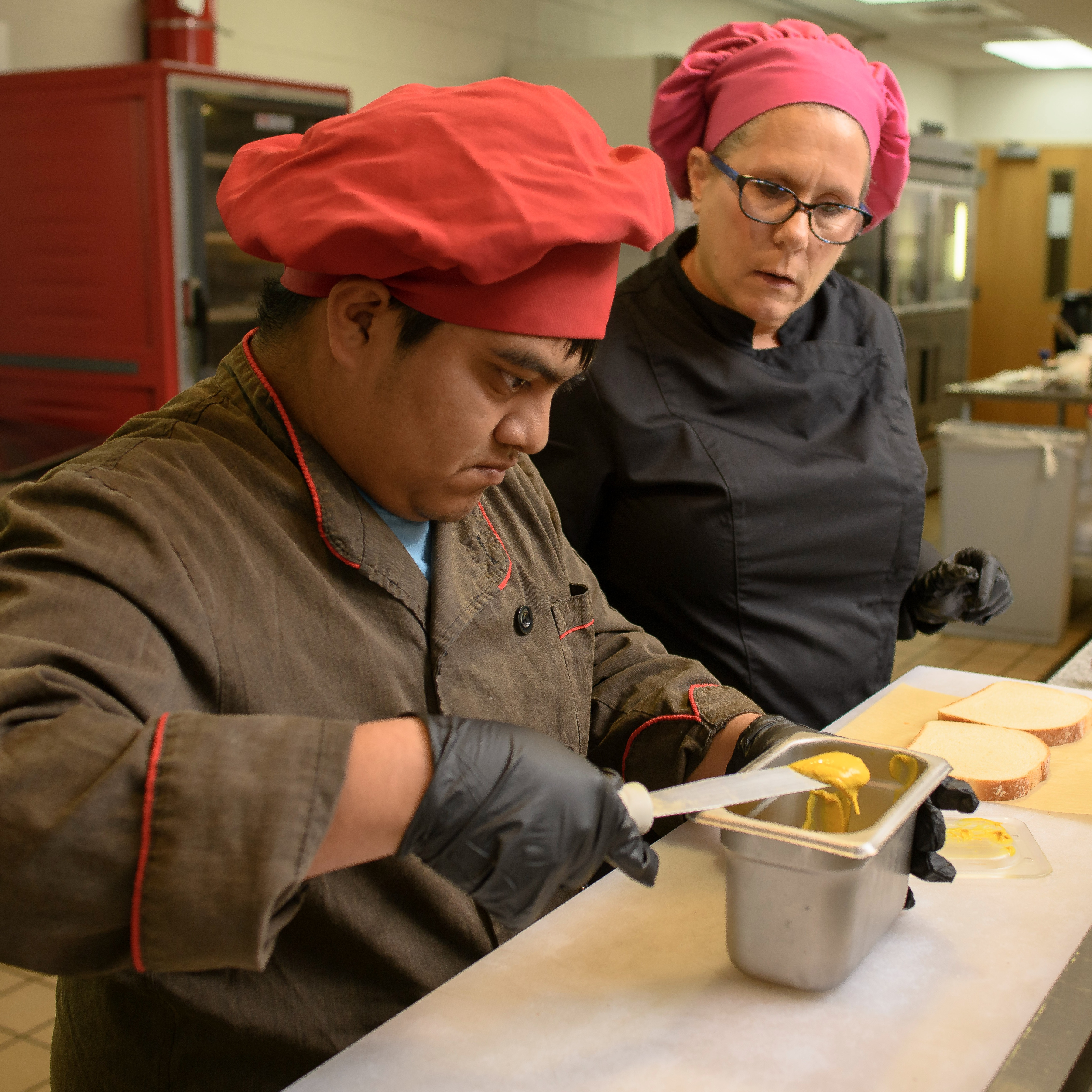 Student making sandwich