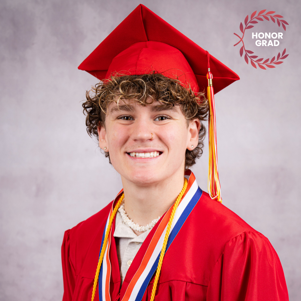 Jonah Abenchuchan wearing a red cap and gown.