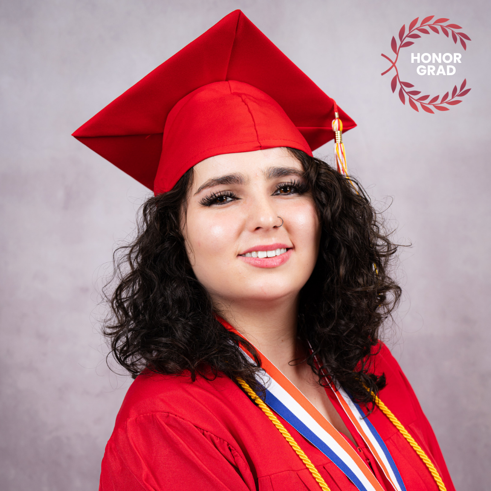 Annalei Allen wearing a red cap and gown.