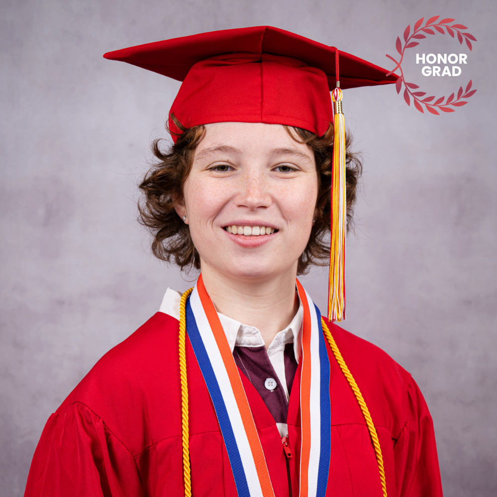 Jocelyn Dagenais wearing a red cap and gown.