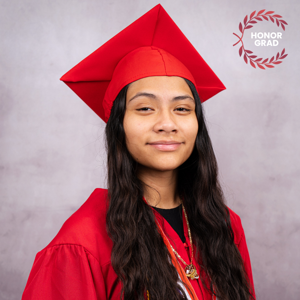 Meilyn Guzman-Gonzalez wearing a red cap and gown.