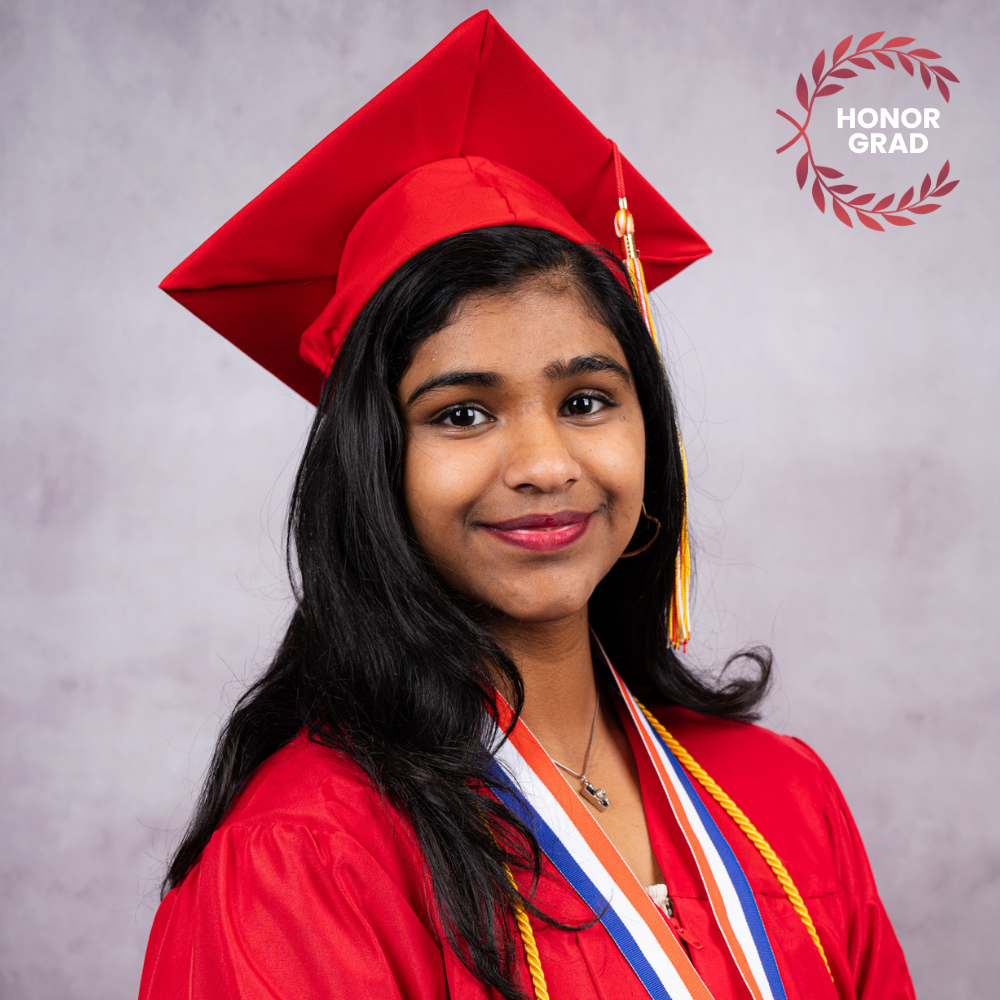 Mareesa Manoj wearing a red cap and gown.