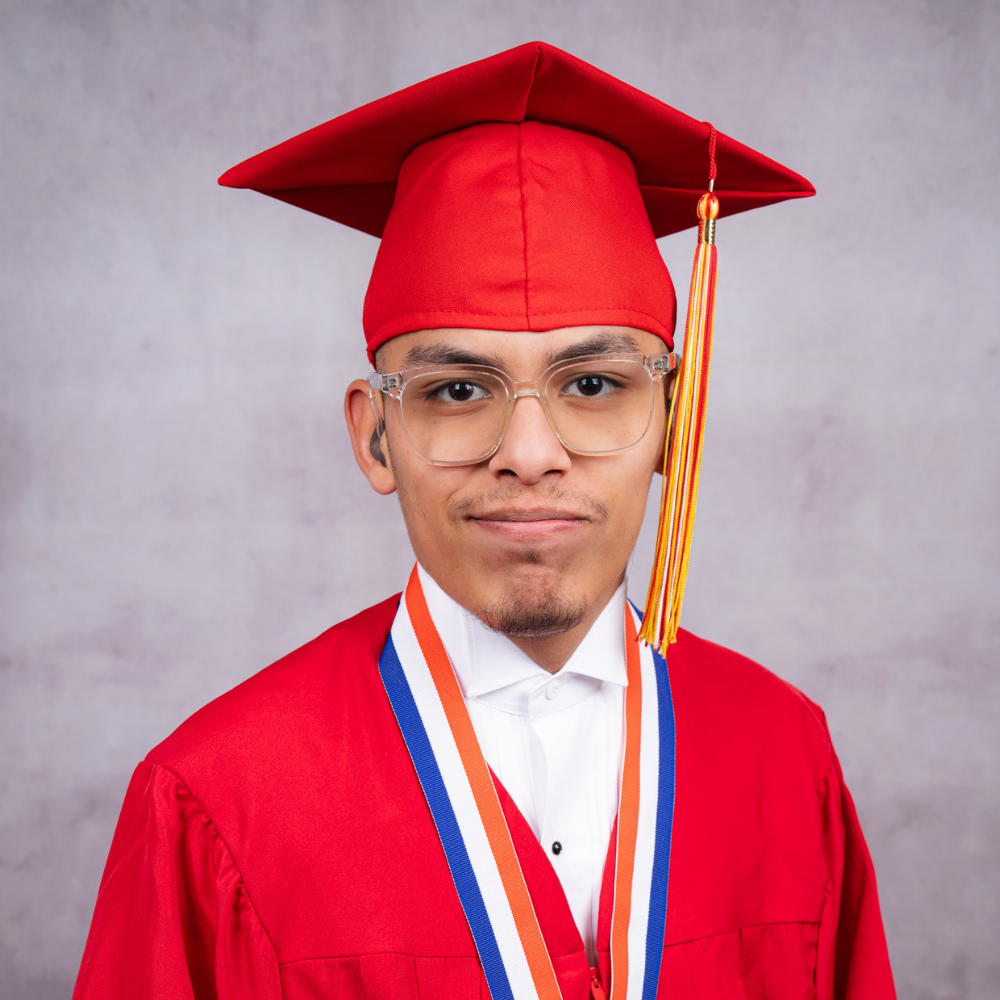 Bryan Mejia-Cantero wearing a red cap and gown.