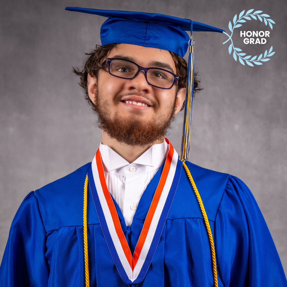 Christian Chapu wearing a blue cap and gown.