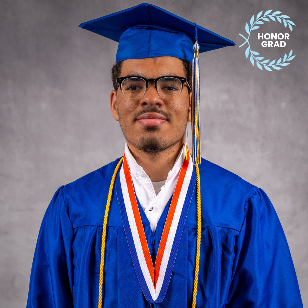 Jack Coleman wearing a blue cap and gown.