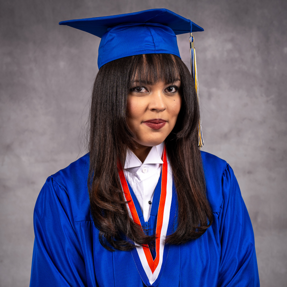 Rhianna Ward wearing a blue cap and gown.