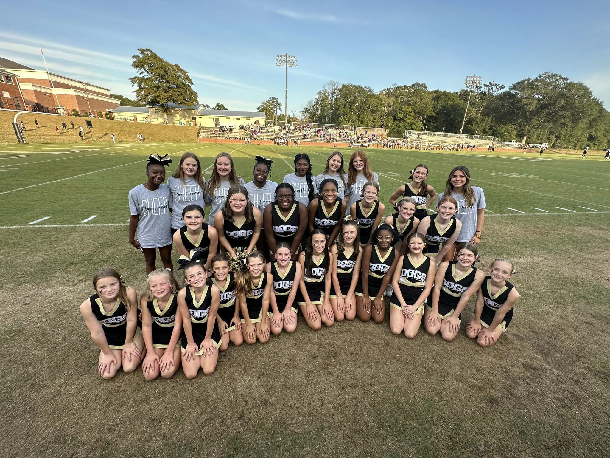 varsity spirit supporting middle school spirit at a home game