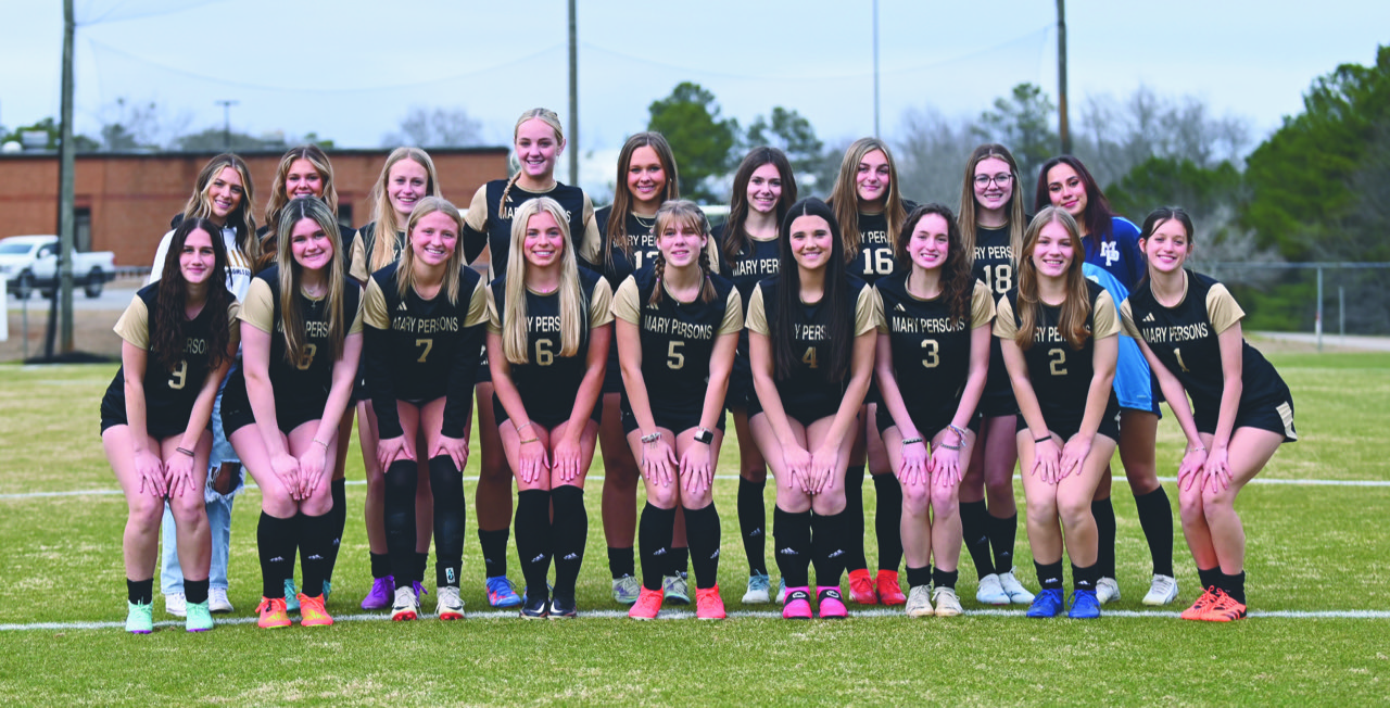group photo of varsity girls soccer team 2024