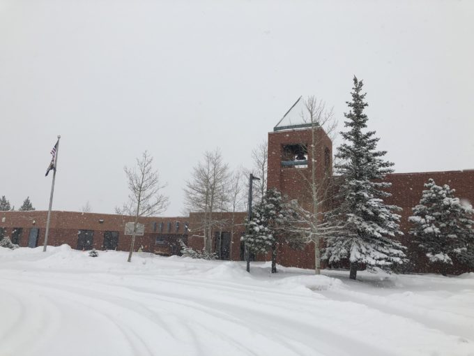 school building with snow