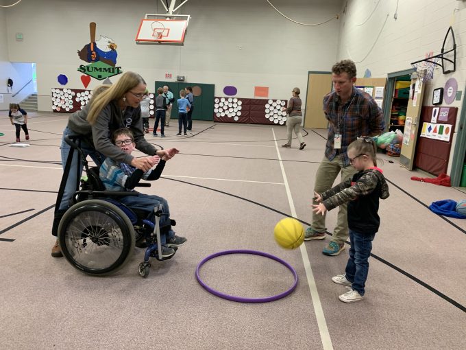 students playing with a ball