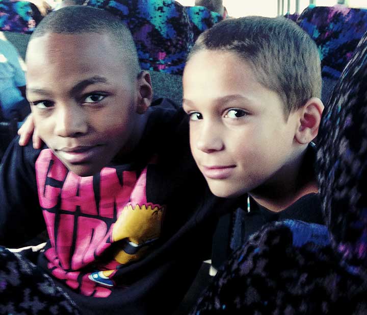Two boys in the bus