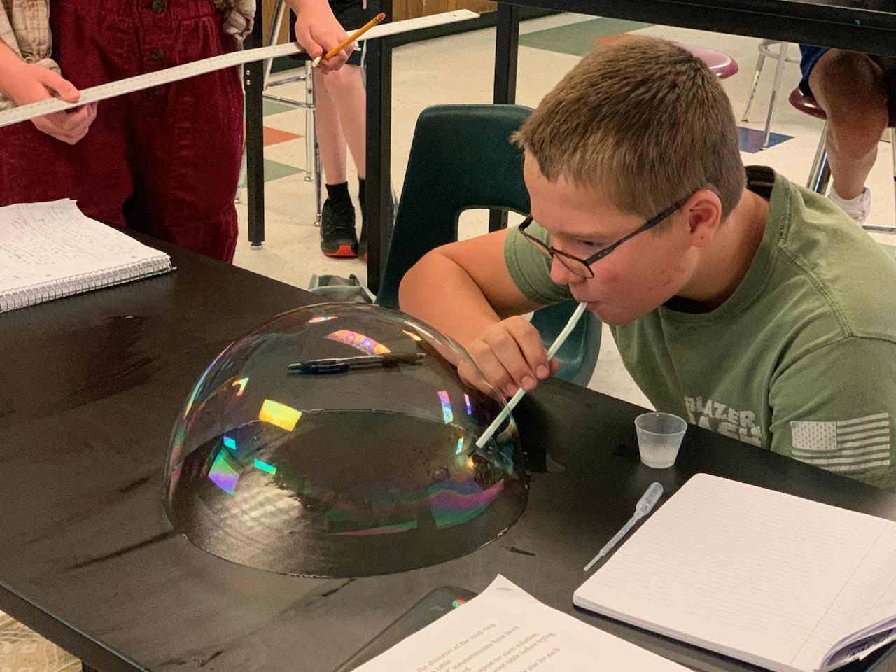 student in science class