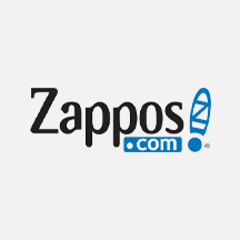 A logo for the website "Zappos.com," featuring a stylized letter 'z' and a globe graphic, indicating an international business focus.